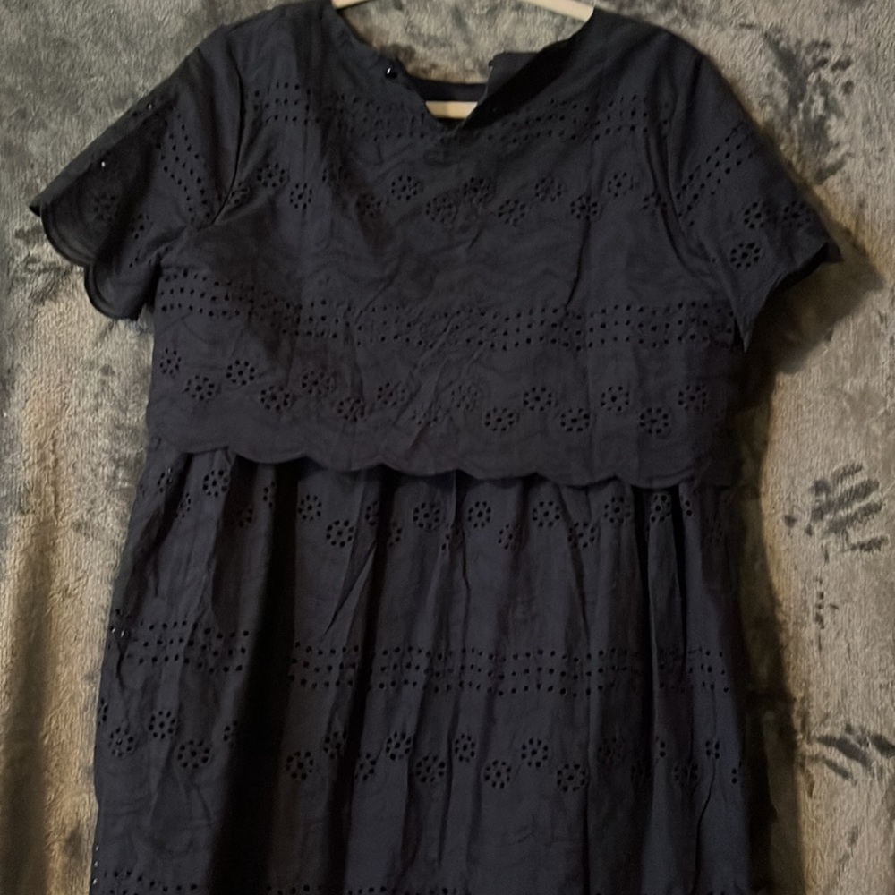 Navy blue floral crotchet detail dress that is fully lined